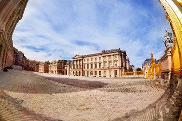 Fototapeta na wymiar Versailles Palace courtyard at sunny day in France