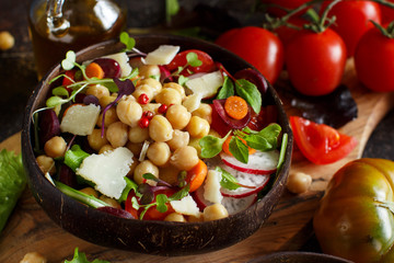 Chickpea salad with vegetables and microgreens