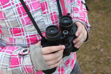 child with binoculars