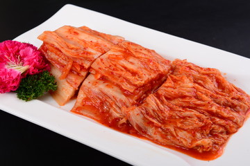 raw salmon steak on a plate