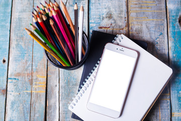 table with notepad ,smartphone