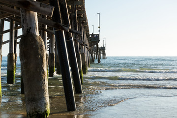 Cement covered ocean pier low tide west coast