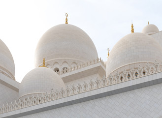 Fototapeta na wymiar Domes of Sheikh Zayd Grand Mosque in Abu Dhabi, UAE