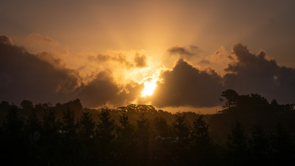 Beautiful sunset through the clouds