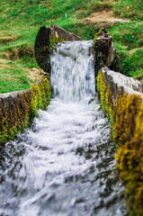fresh and clean spring water flows downstream