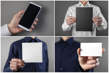 A man holding black booklet