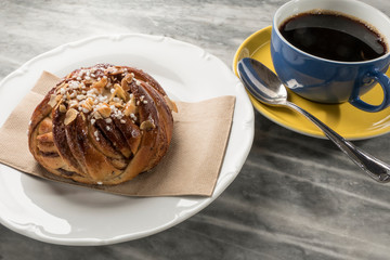 Stockholm, Sweden A coffee and a cinnamon bun.