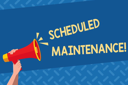 Handwriting text Scheduled Maintenance. Conceptual photo predetermined maintenance carried out at regular time Human Hand Holding Tightly a Megaphone with Sound Icon and Blank Text Space