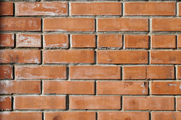 Background of ordinary red brick wall. City background