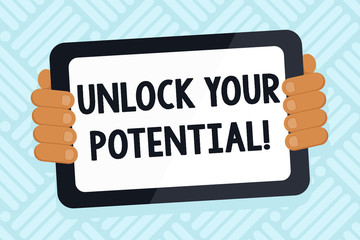 Naklejka premium Handwriting text writing Unlock Your Potential. Conceptual photo release possibilities Education and good training is key Color Tablet Smartphone with Blank Screen Handheld from the Back of Gadget