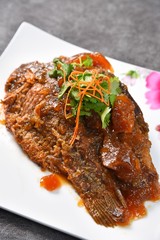 grilled beef steak with vegetables on white plate