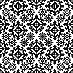 Fototapeta premium Seamless pattern with american indian style. Tribal ornament plaid. Navajo background. Textile geo print.