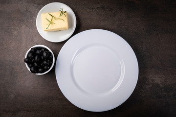 Table setting for a meal.White plate, 