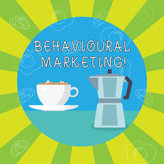 Handwriting text writing Behavioural Marketing. Conceptual photo targets consumers based on their behavior on Web sites White Cup of Frothy Beverage and Kettle with Drawings of Croissant and Egg