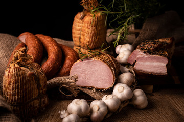 Traditionally smoked, homely sausage in composition with fresh garlic and herbs