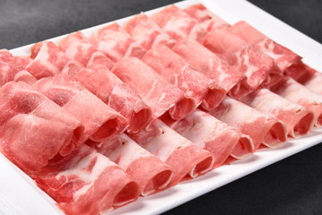 raw meat on a cutting board