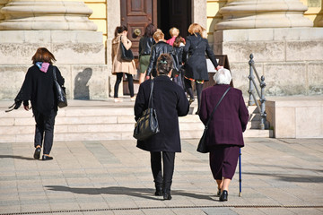 People are going to the church - obrazy, fototapety, plakaty
