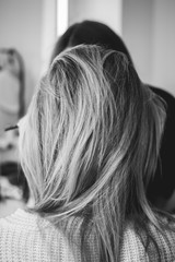 blond woman with long hair in hair studio white and black photo