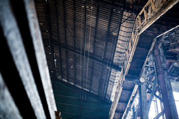 Old steel factory Retro photography Industrial, old factory, metal pipe, dark interior decoration of large hall for production or warehouse.soft focus.