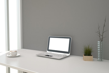 computer with blank screen on table