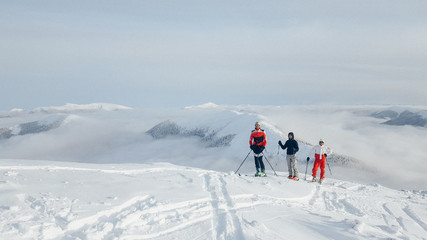 Fototapeta na wymiar Group of skiing tours