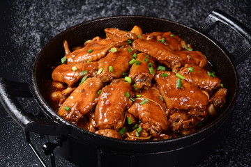 frying pan with sausage and potato ragout