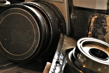 Close up of a vintage camera with lens. Analog camera that works with rolls. 