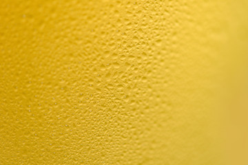 Beer bubbles glass close up of mug beer with water drop on texture background