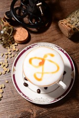 Obraz na płótnie Canvas cup of tea and cake on wooden table