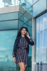 Business woman talking on the phone in the office