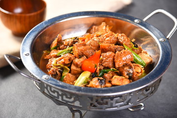 beef stew in pan with vegetables