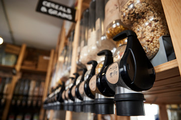 Dispensers For Cereals And Grains In Sustainable Plastic Free Grocery Store