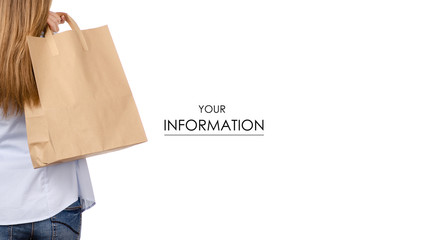 Woman holding a paper bag package shopping beauty pattern on a white background. Isolation, back view