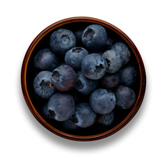 blueberries in a bowl isolated on white