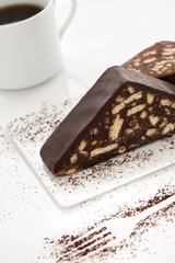Cake slice, white porcelain coffee cup, white background,  cacao, fork shaped, white table top, close up, macro shot