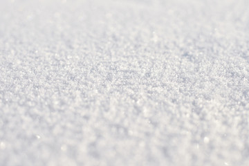 Shining snow background. Selective focus. 