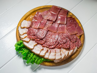 Meat plate set with salami, bacon, hamon
