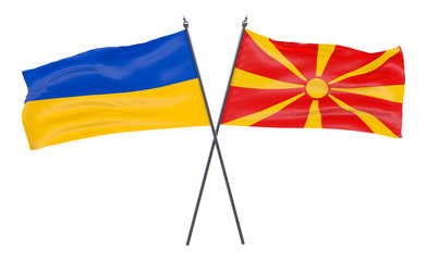 Ukraine and Macedonia, two crossed flags isolated on white background. 3d image