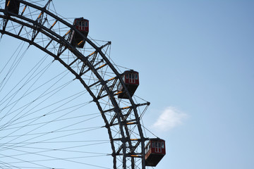 ferris wheel against blue sky in Vienna