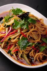 spaghetti with tomato sauce and basil