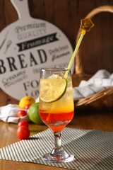 fresh orange drink with ice and lemon
