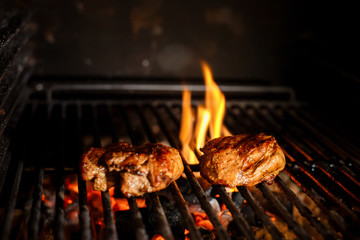 Beef Steak On Grill With Rosemary Pepper And Salt