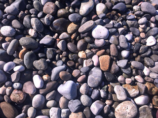 Abstract nautical background with pebbles, top view.