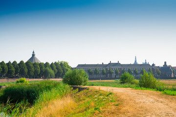 Fototapeta na wymiar nature park Bossche Broek in Den Bosch, 's Hertogenbosch, buildings, tower, church, The Netherlands