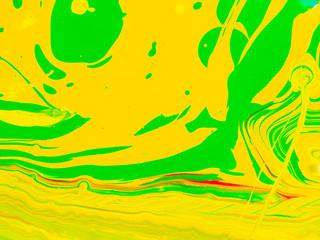 Fototapeta na wymiar splashes of red and yellow green paint on a white background