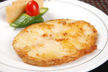 omelet with bacon and cheese on white plate