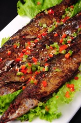 grilled steak with vegetables on white plate