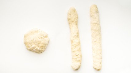 Step by step visual instructions of of braiding a challah bread