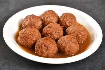 meatballs with sauce in bowl