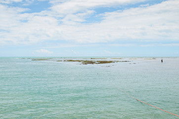In the middle of sea, banks of corals of Caribessa, Bessa beach (praia do Bessa) at Joao Pessoa, Brazil. Touristic destination. Low tide 0.0